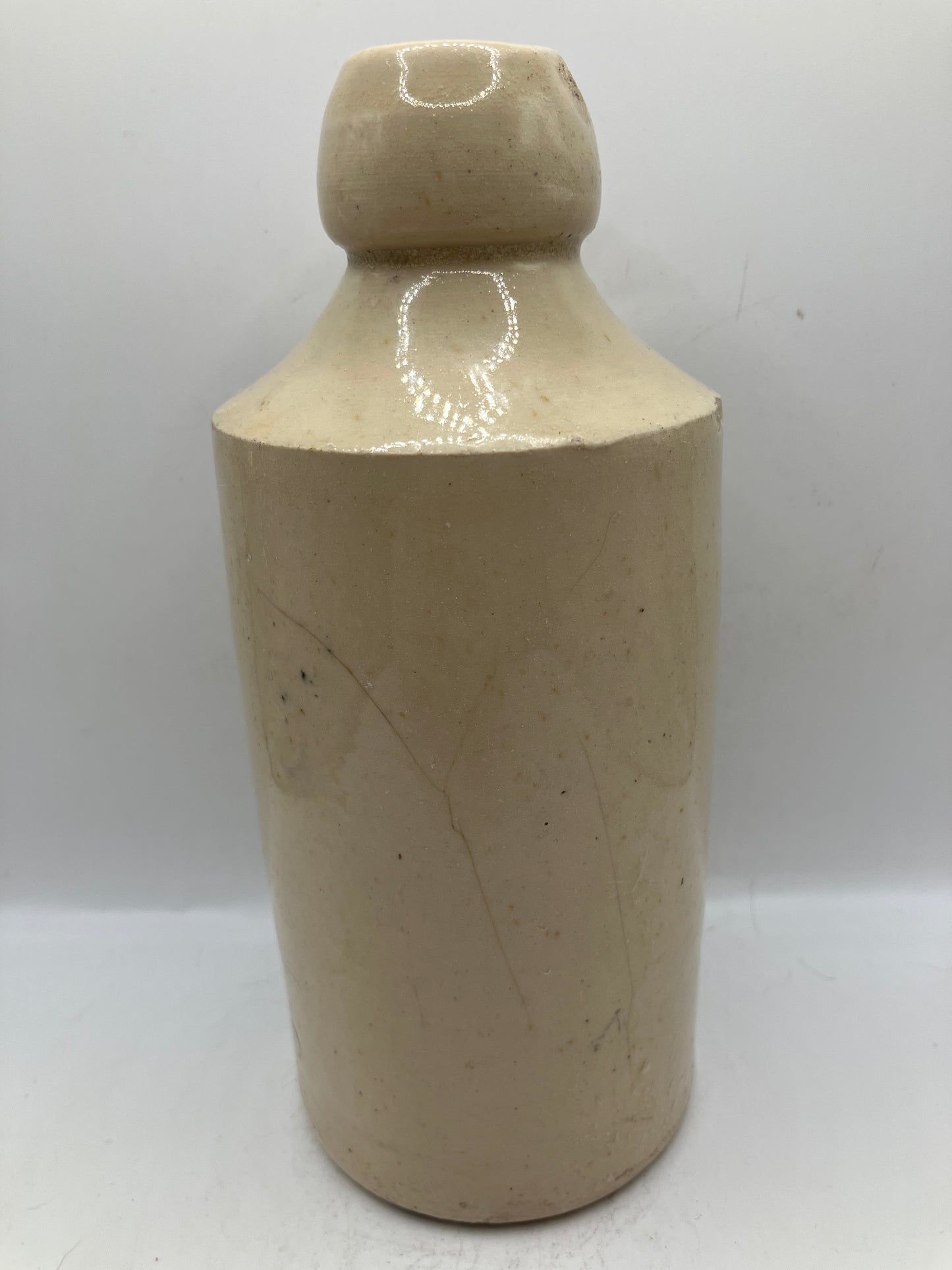 White stoneware ginger beer bottle, Canterbury