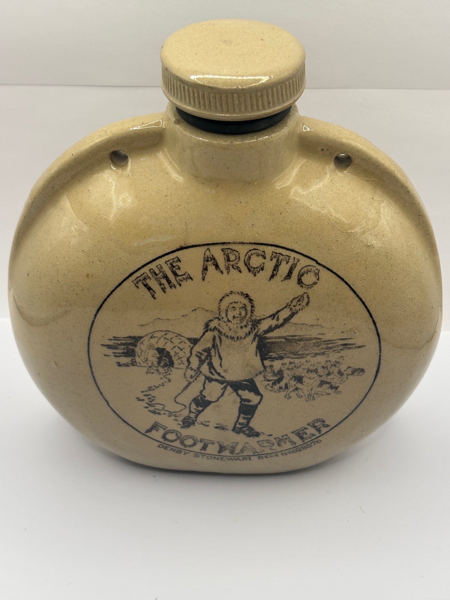 Old stoneware advertising foot warmer, The Arctic Footwarmer