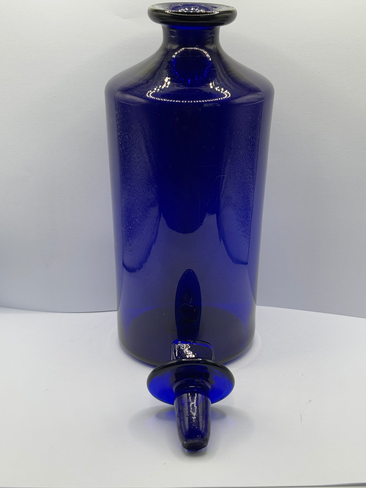 Old pontilled blue glass chemist jar, chemist round. Pharmacy