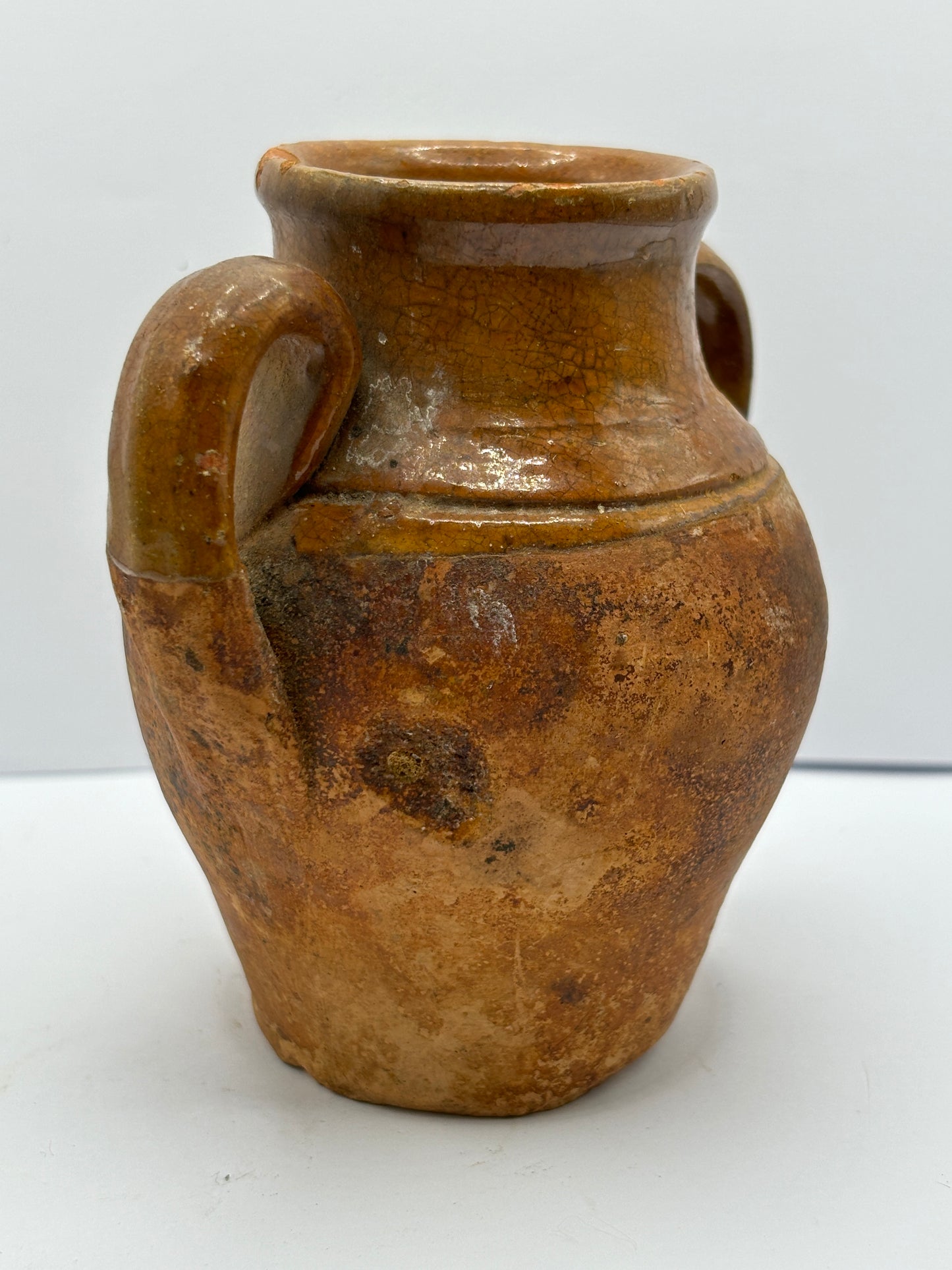 Old small double handled stoneware jug