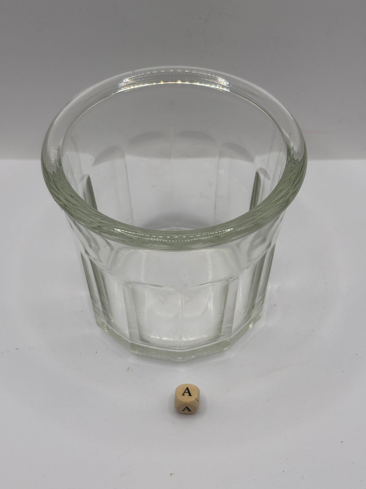 Old clear glass French jam jar (a)