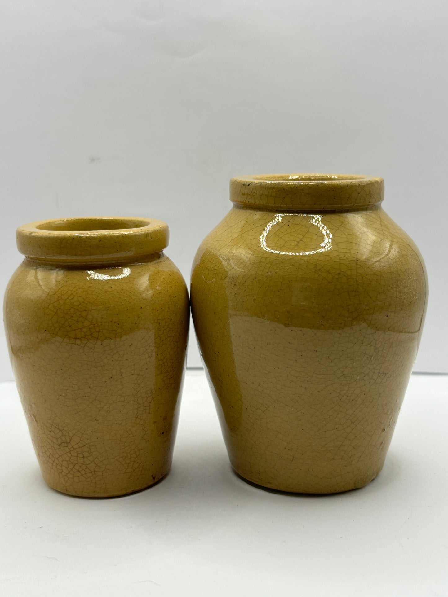 2 advertising cream pots, Stained & crazed