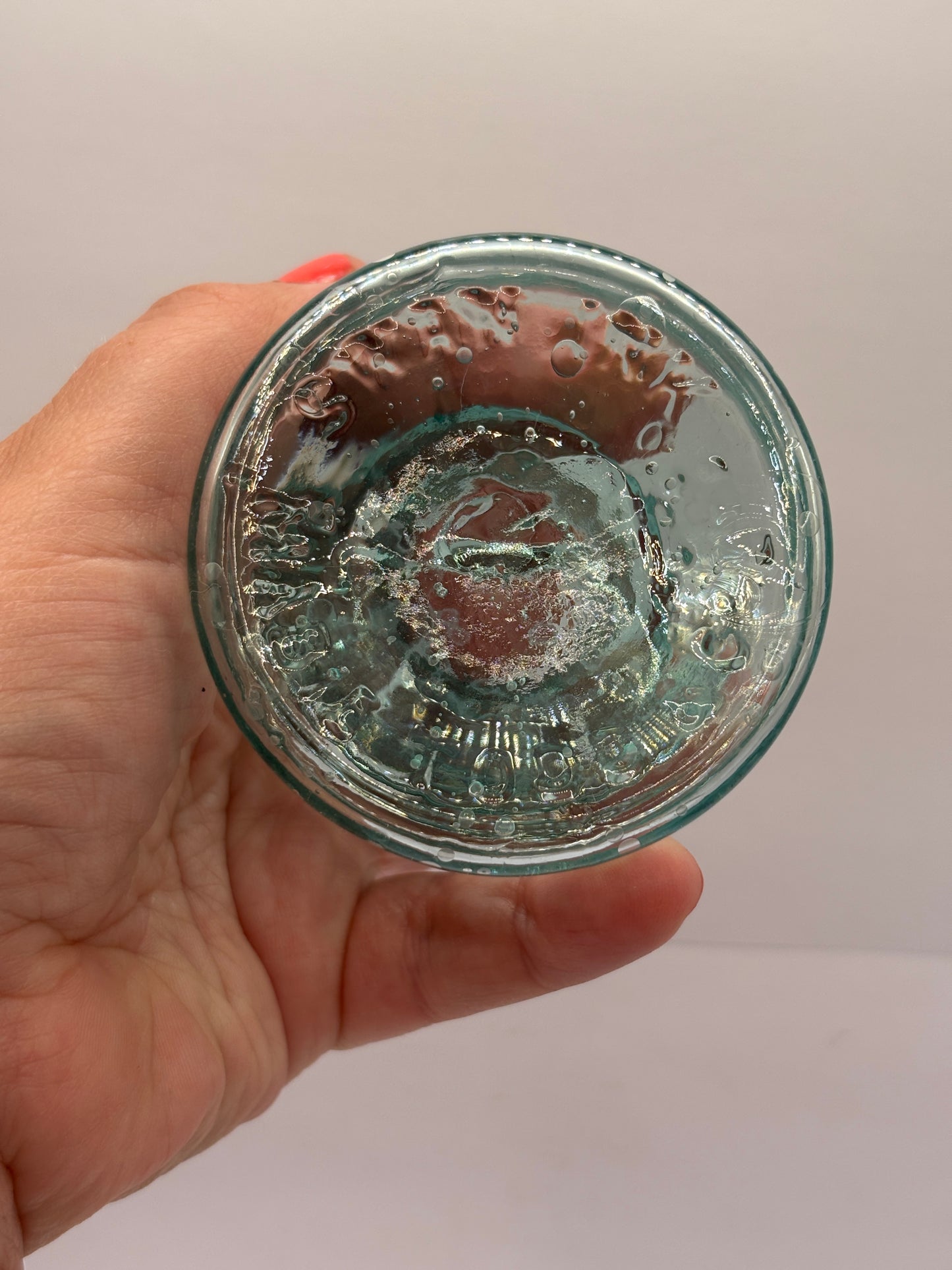 Old aqua glass inkwell, swan ink. Ink bottle