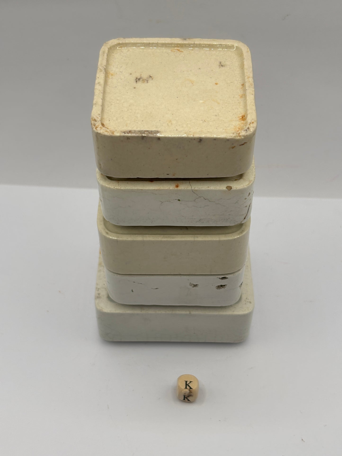 5 old square bases, stackers (K) damages