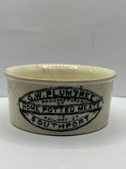 Damaged Plumtree home potted meats advertising pot