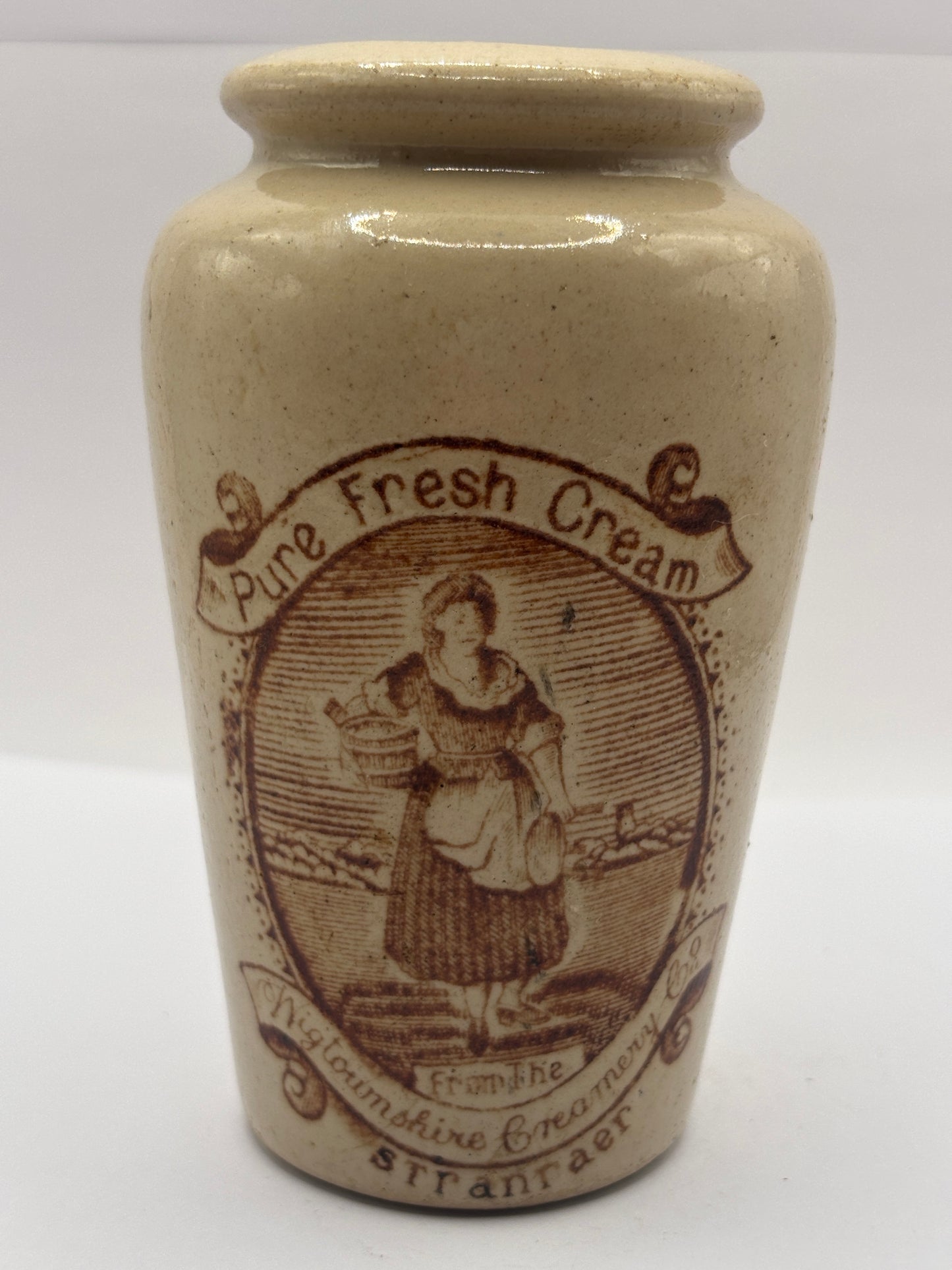 Old stoneware advertising cream pot, pure fresh cream Stranraer. Serpia print. milk maid