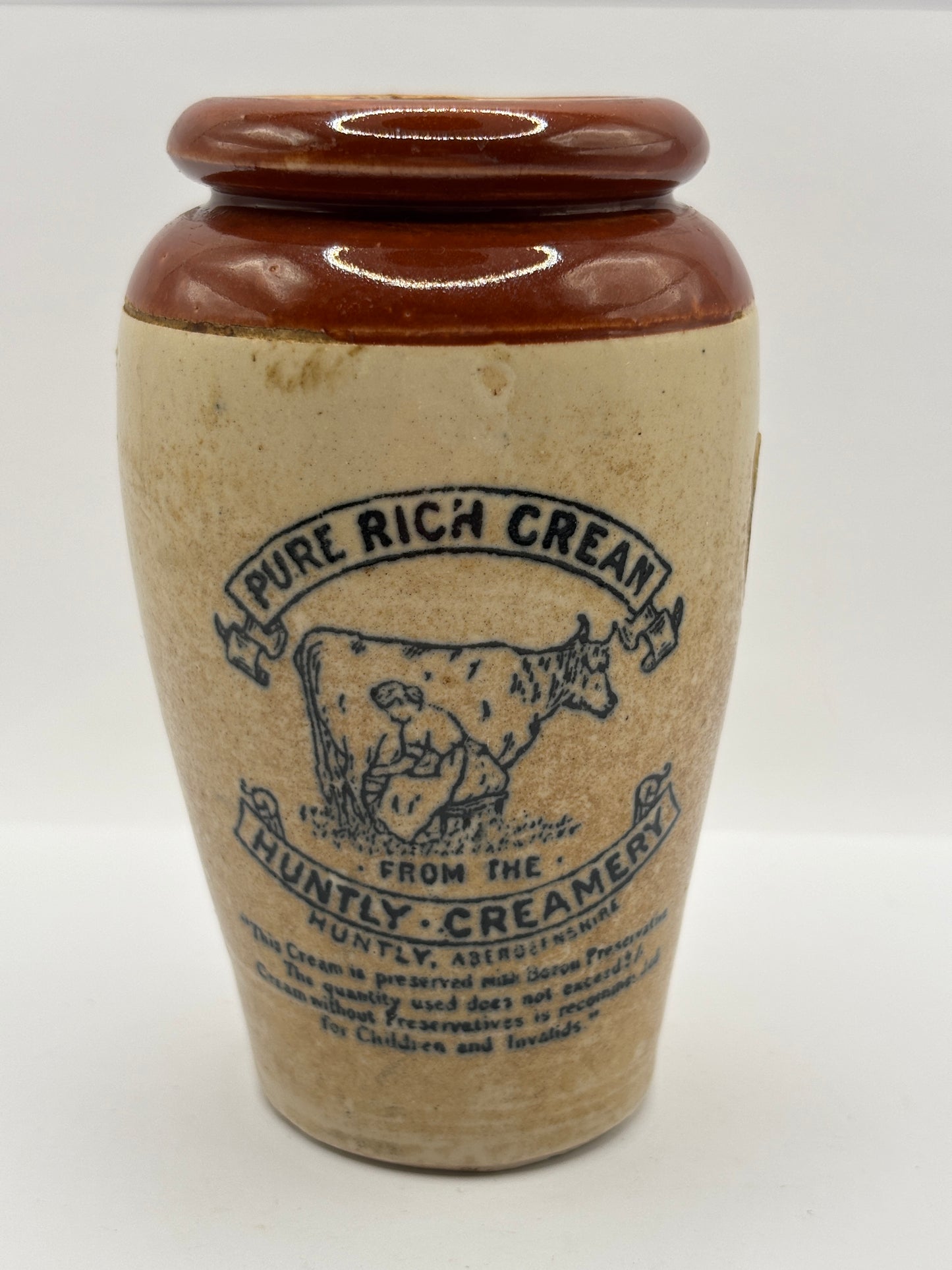 Old advertising cream pot, Huntly creamery. Milk maid. Pure rich cream
