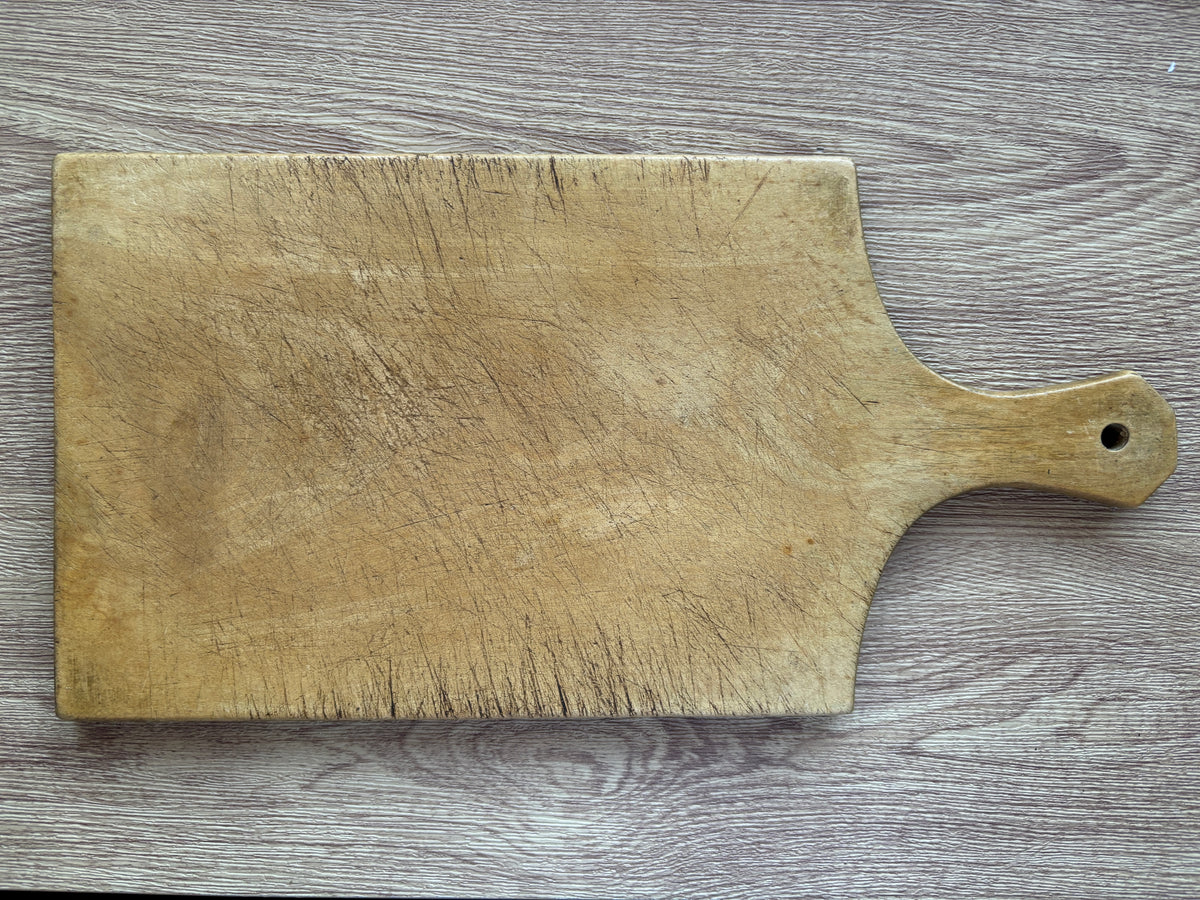 Old wooden cheese board