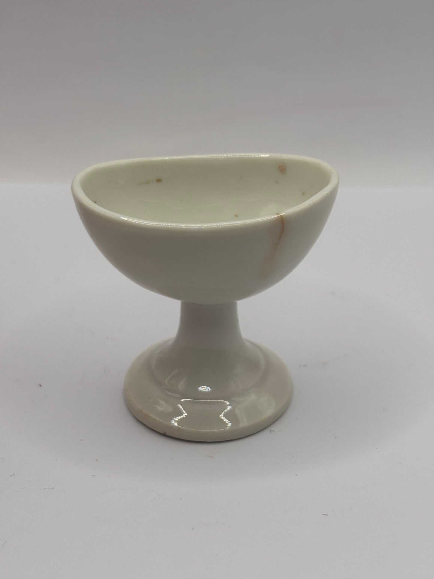 Old porcelain eye bath