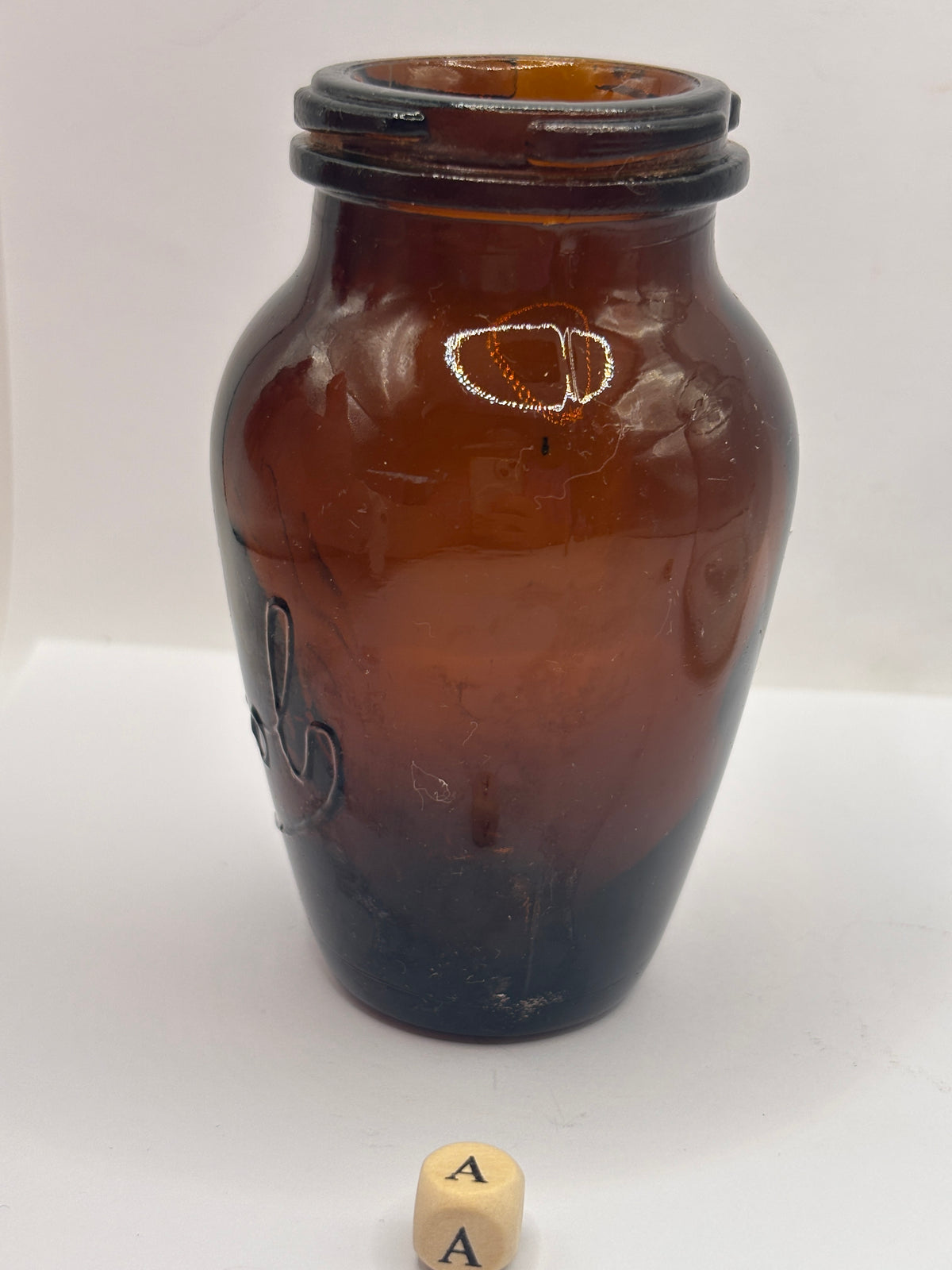 Old amber glass Virol jar (a) 10.5cms