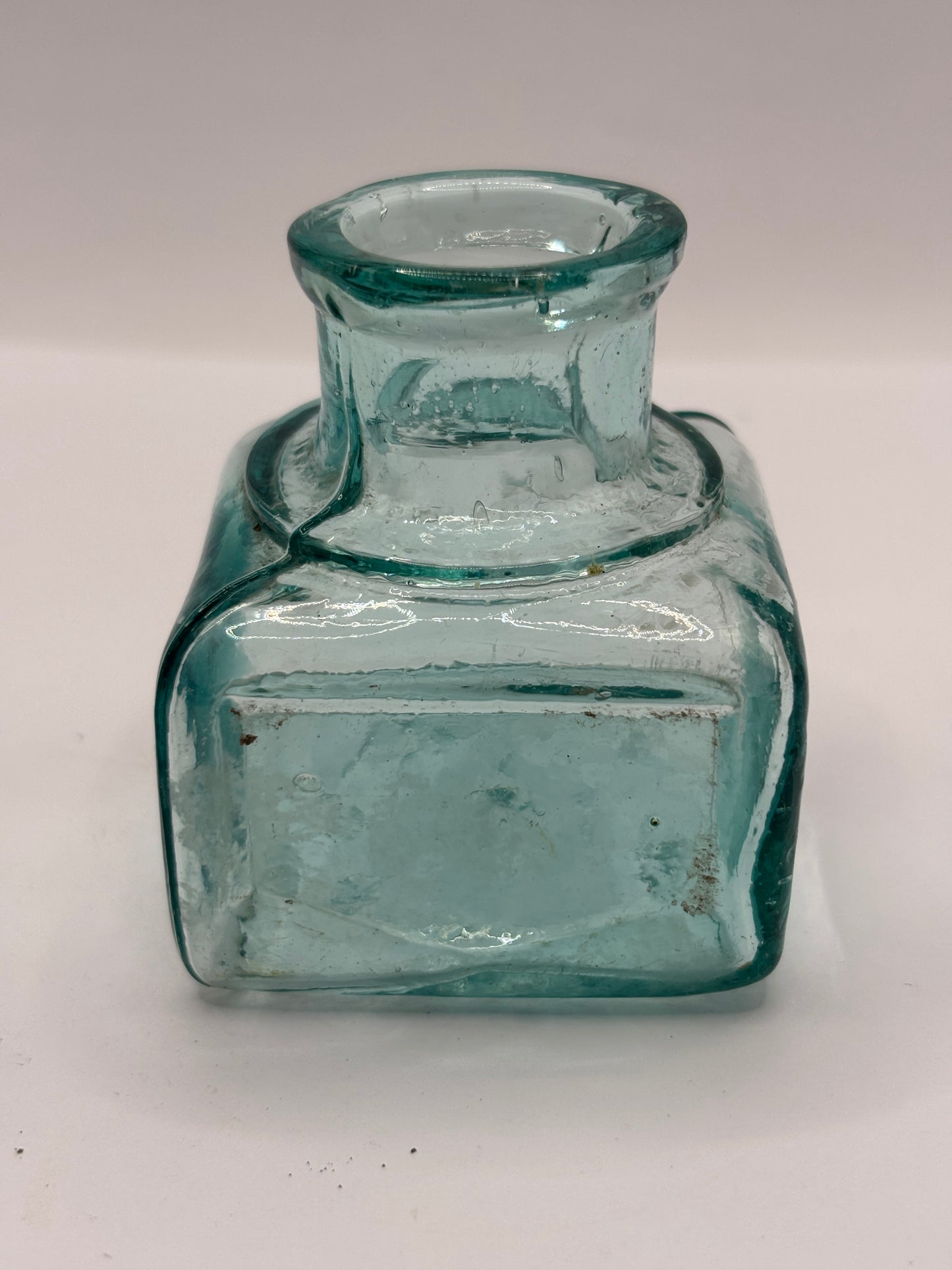 Old aqua glass advertising inkwell, ink bottle. Fields ink