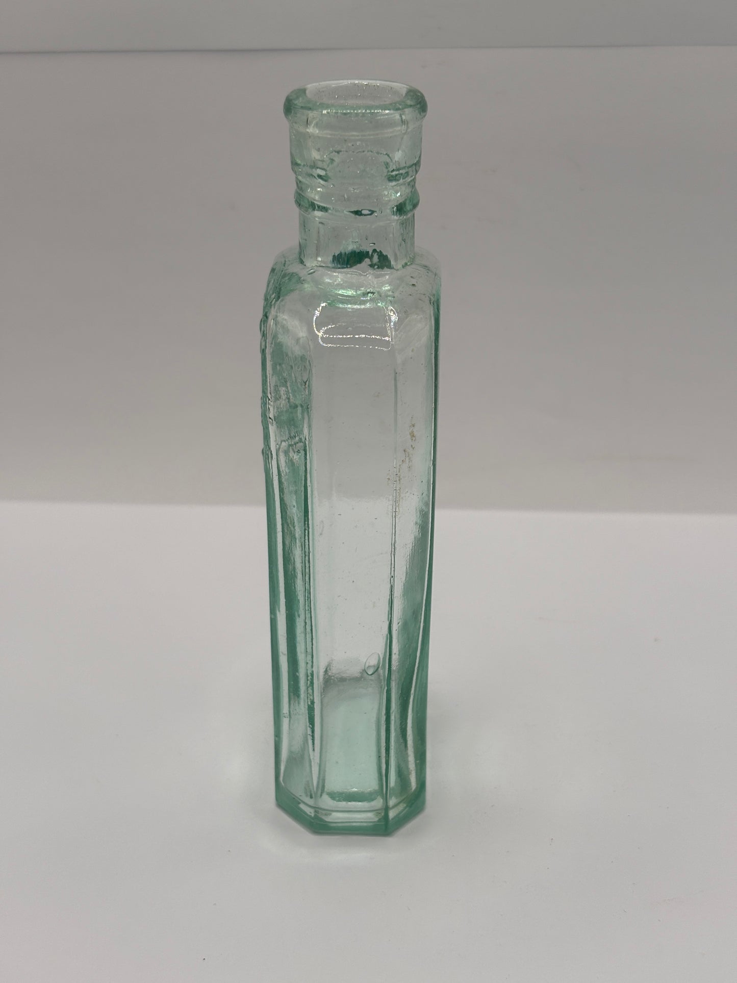 Old glass advertising chemist bottle, Days oil of the night