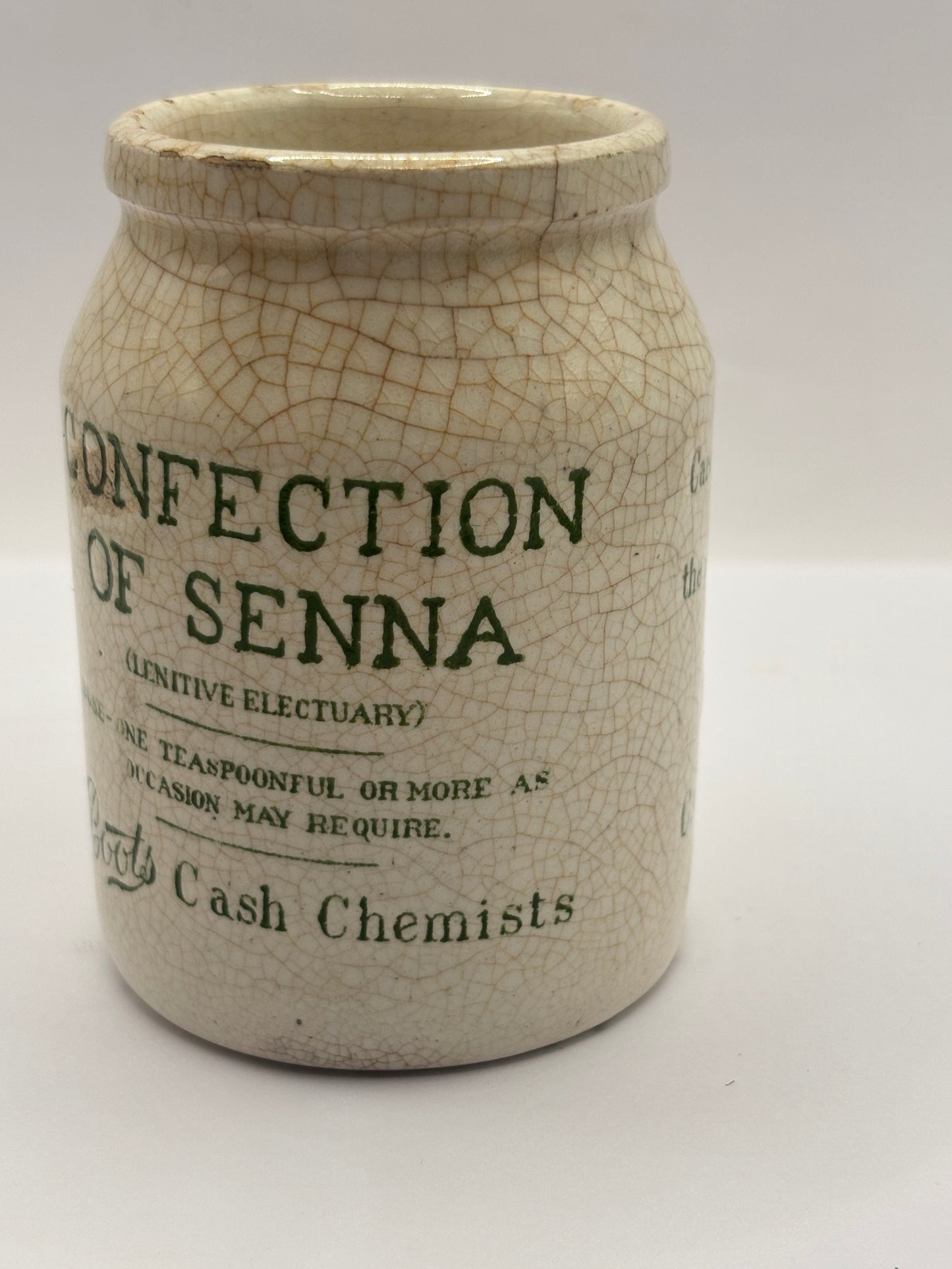 Old stoneware advertising jar, Boots confection of senna