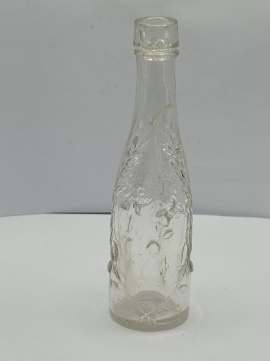 Small roses lime juice bottle