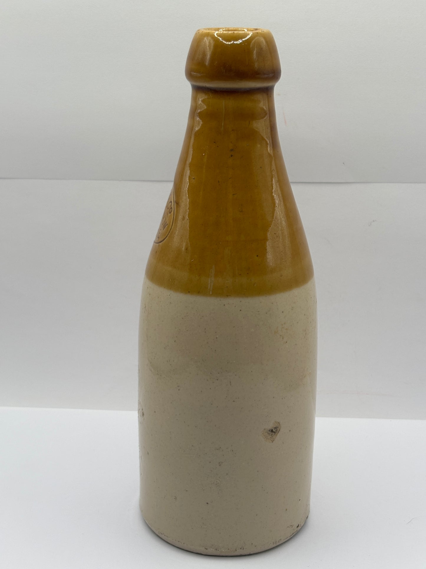 Old stoneware stout bottle, John Mackay & Co