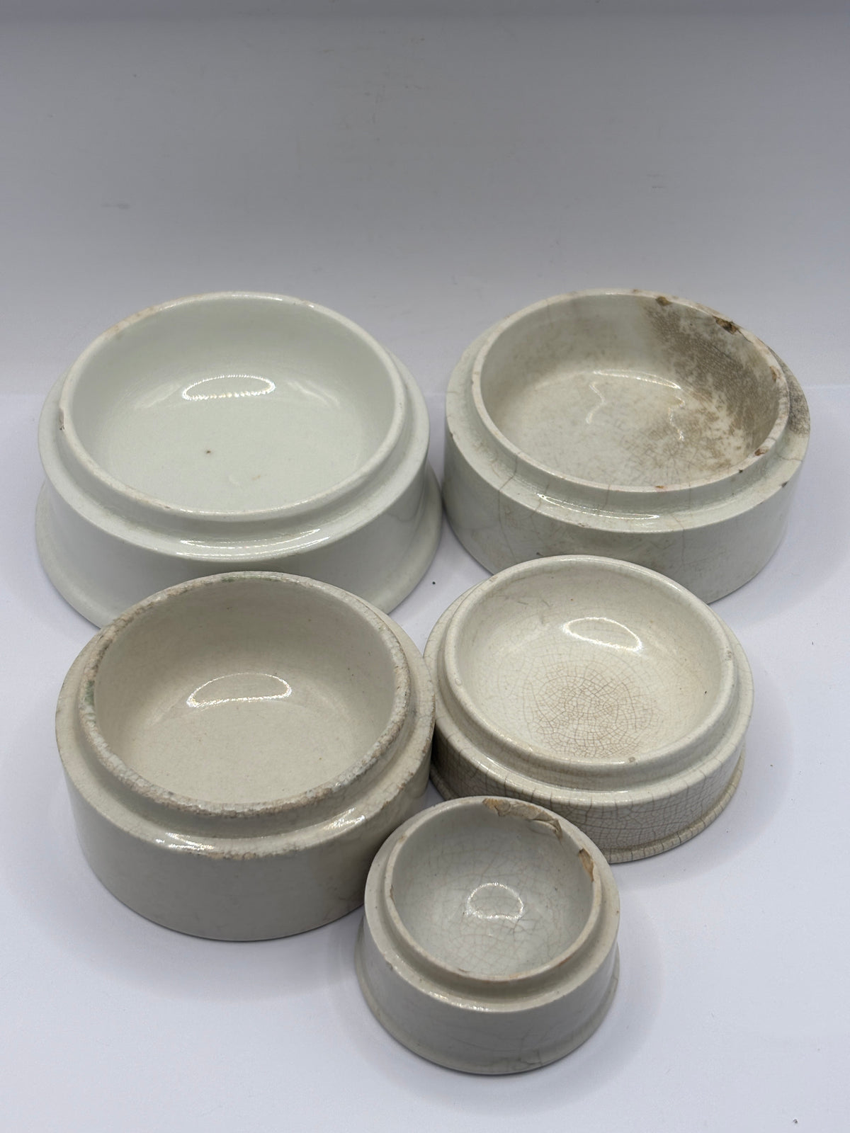 5 old stoneware pot lid bases, stackers (a)