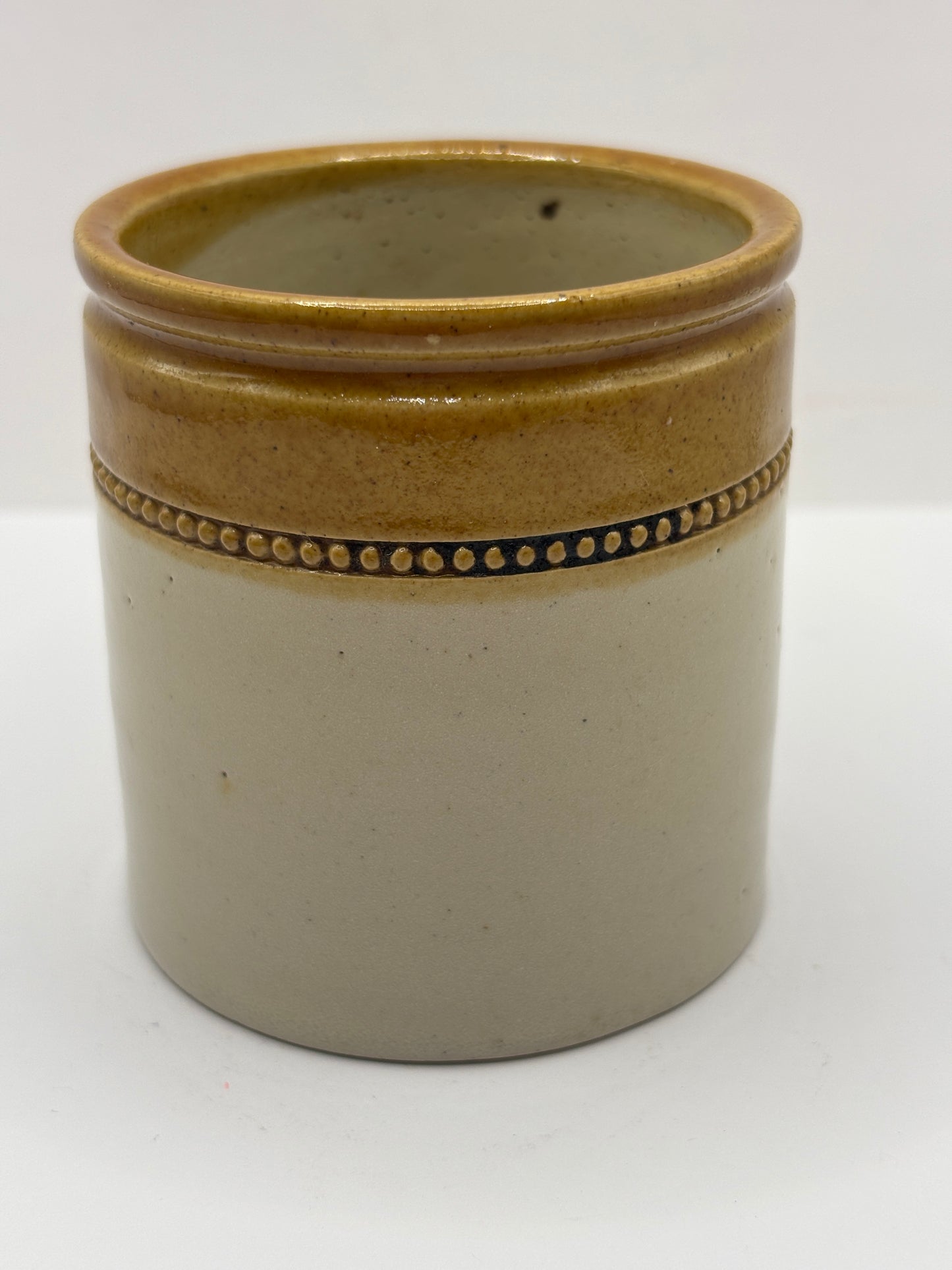 Old small brown top stoneware jar