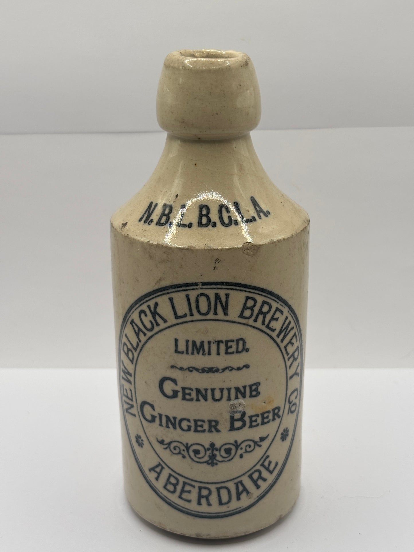 Old stoneware ginger beer bottle, New black lion brewery Co. Aberdare
