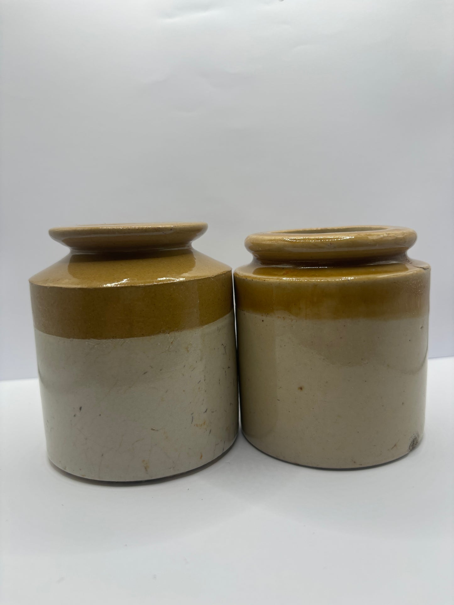 2 small stoneware jars