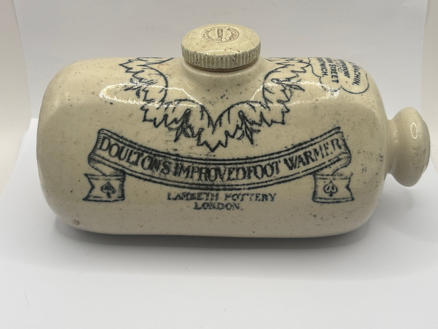 Old Doultons advertising footwarmer. Doultons improved foot warmer