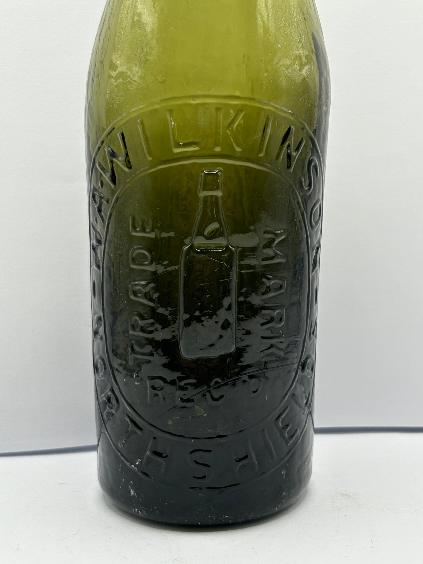 Old green glass North Sheilds beer bottle