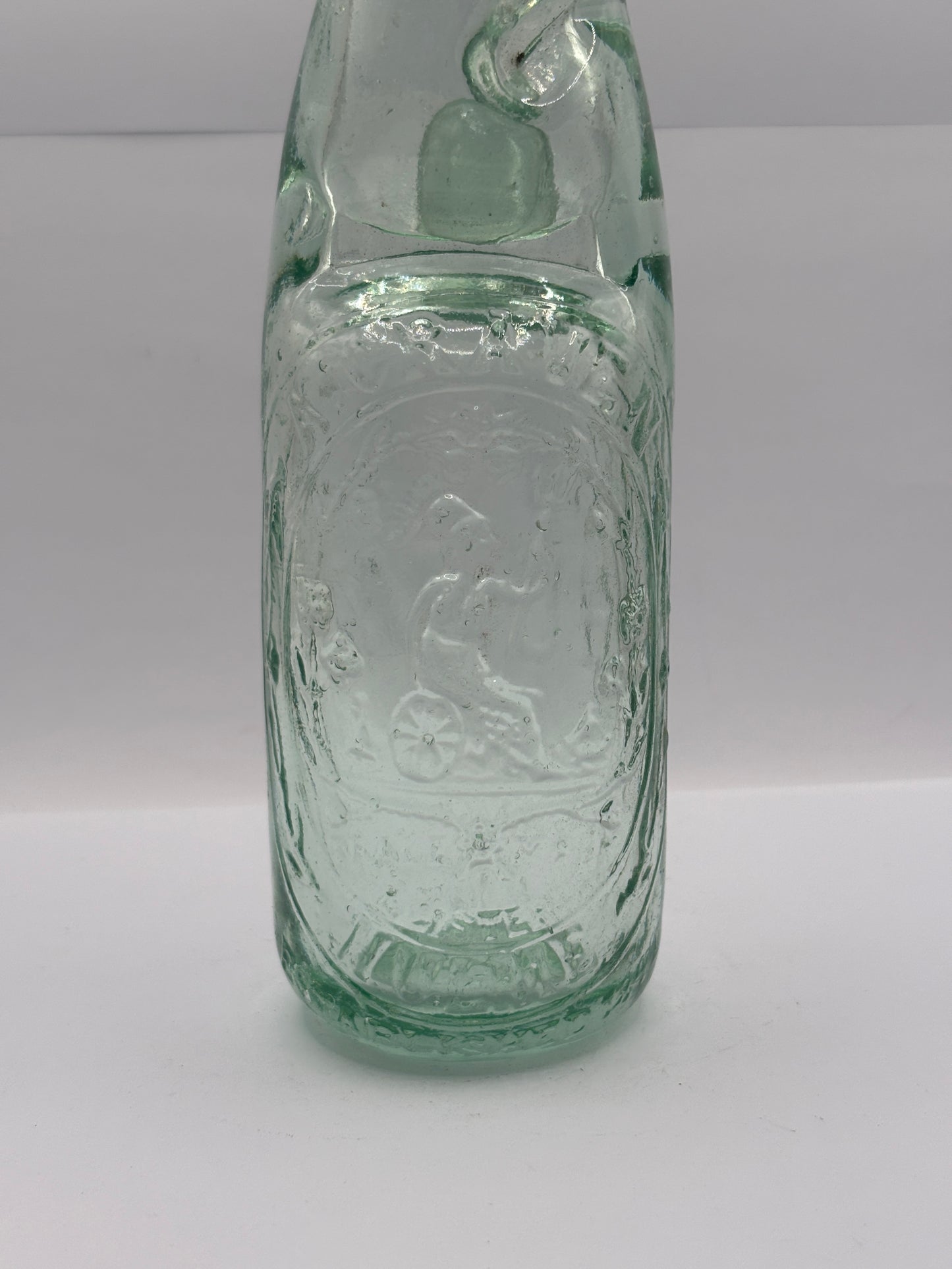 Old Hulme codd bottle, with marble. A.craven Hulme
