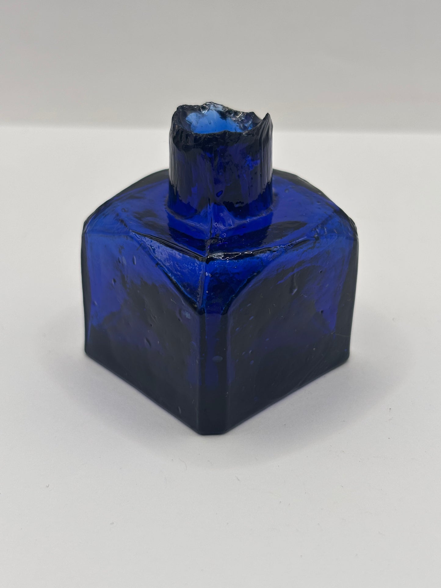 Old cobalt blue glass inkwell, ink bottle