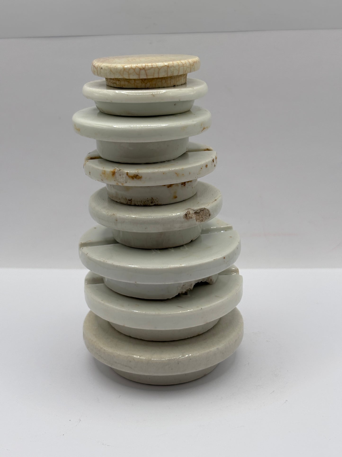 8 stoneware lids, stacking lids. Damaged