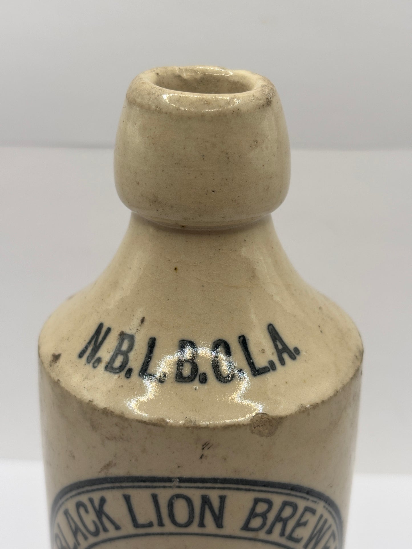 Old stoneware ginger beer bottle, New black lion brewery Co. Aberdare