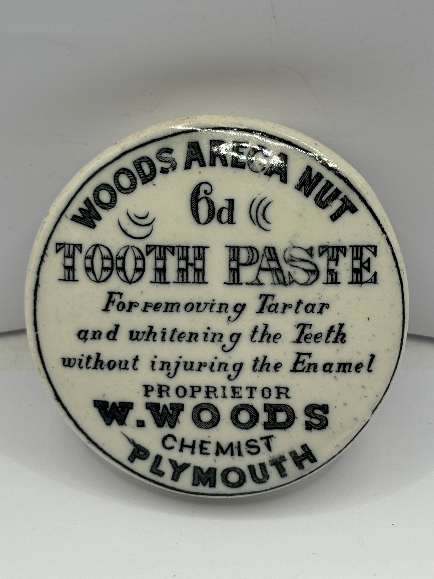 Old Woods advertising pot lid