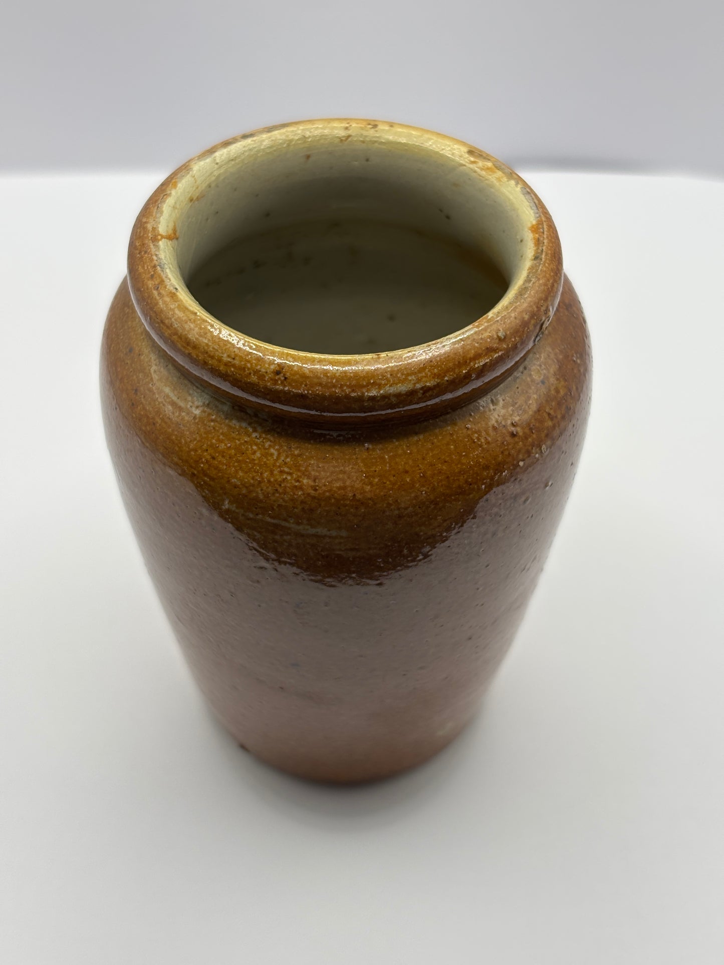 Old brown stoneware cream pot