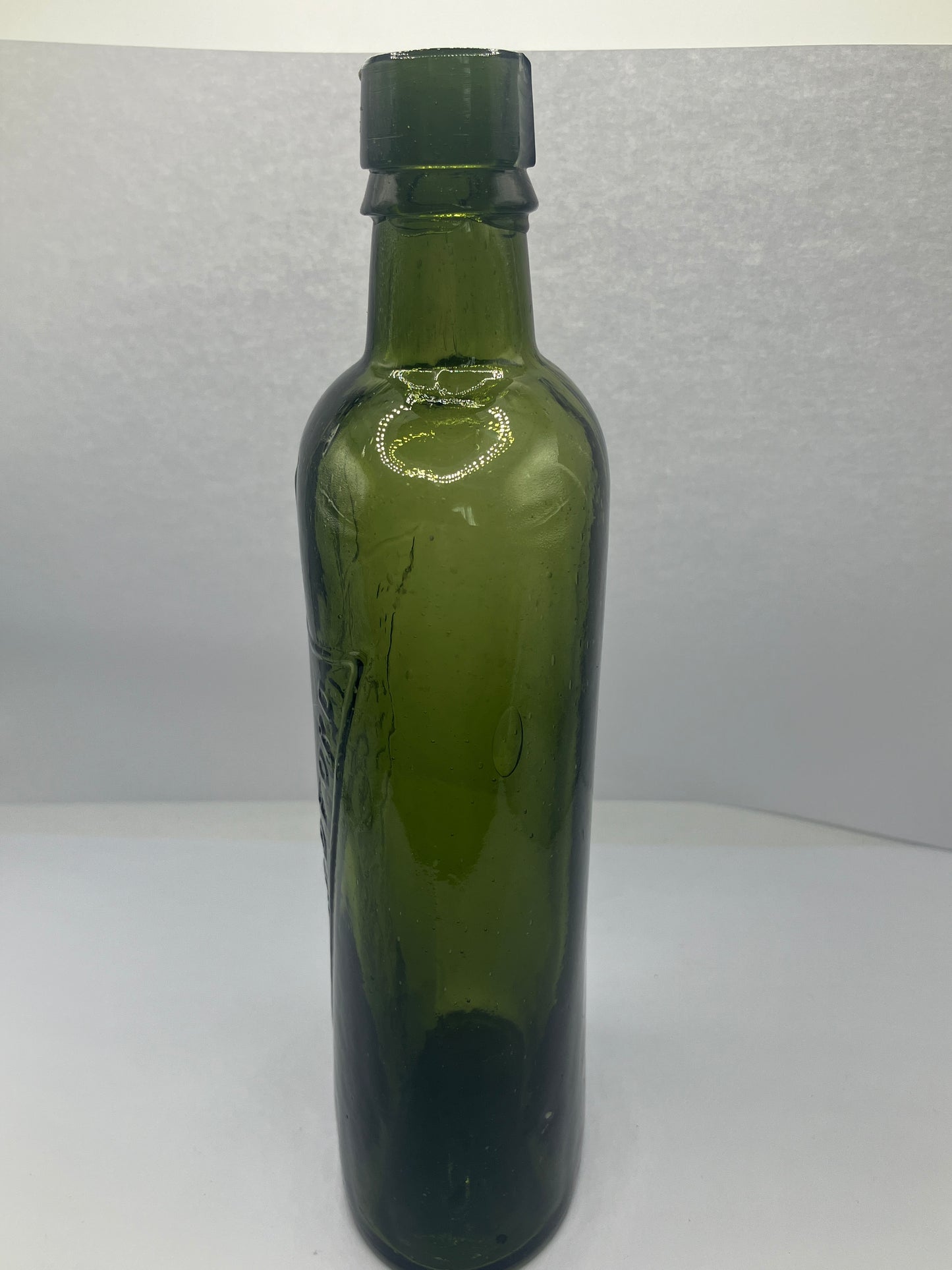 Dark green Bradford chemist bottle