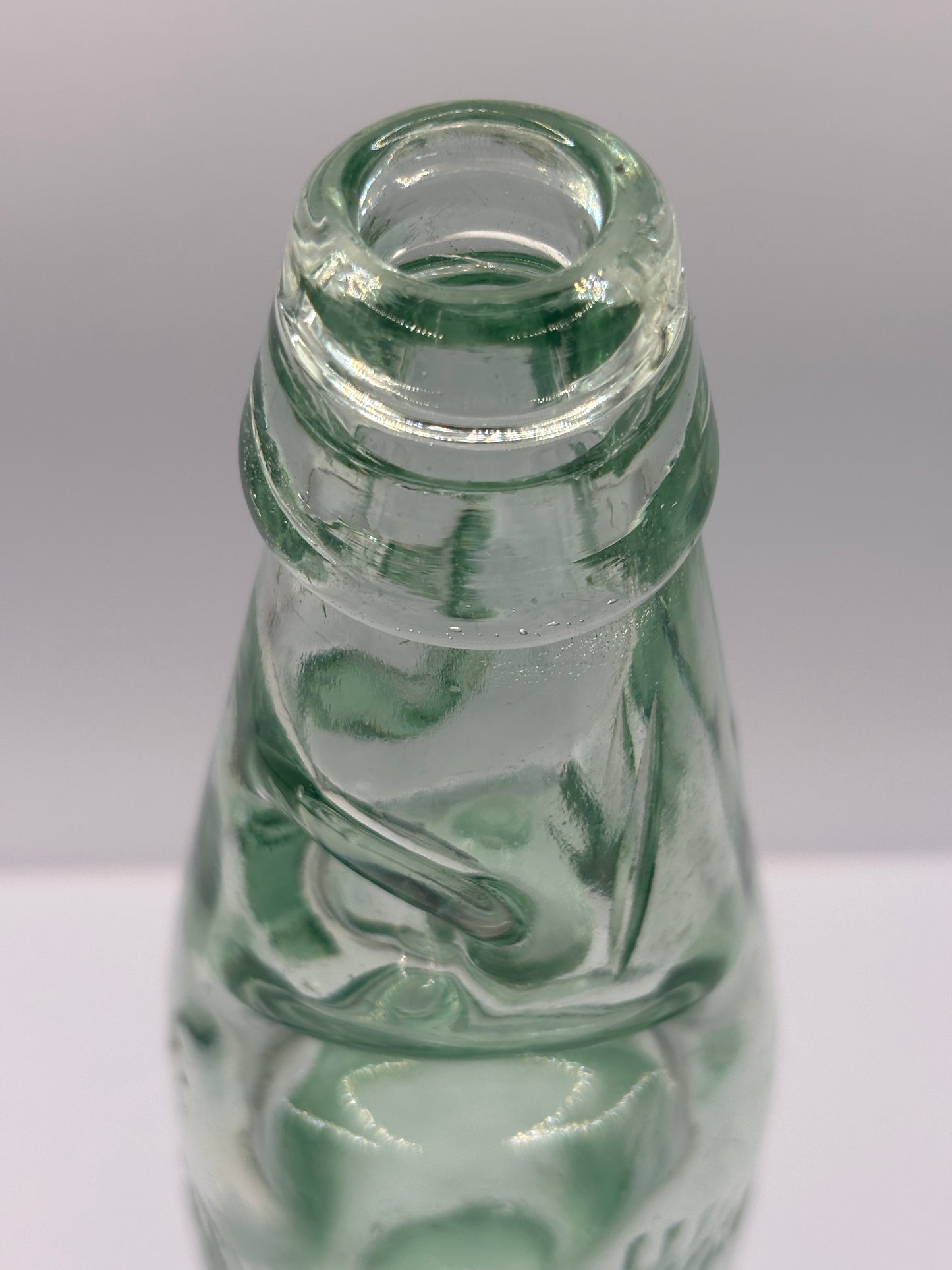 Old pictorial Rochdale codd bottle. Marble bottle