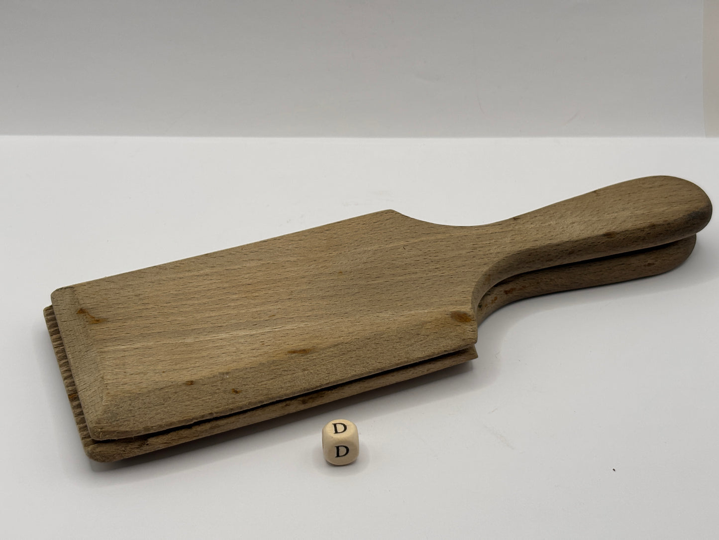 Old wooden butter pats (D)