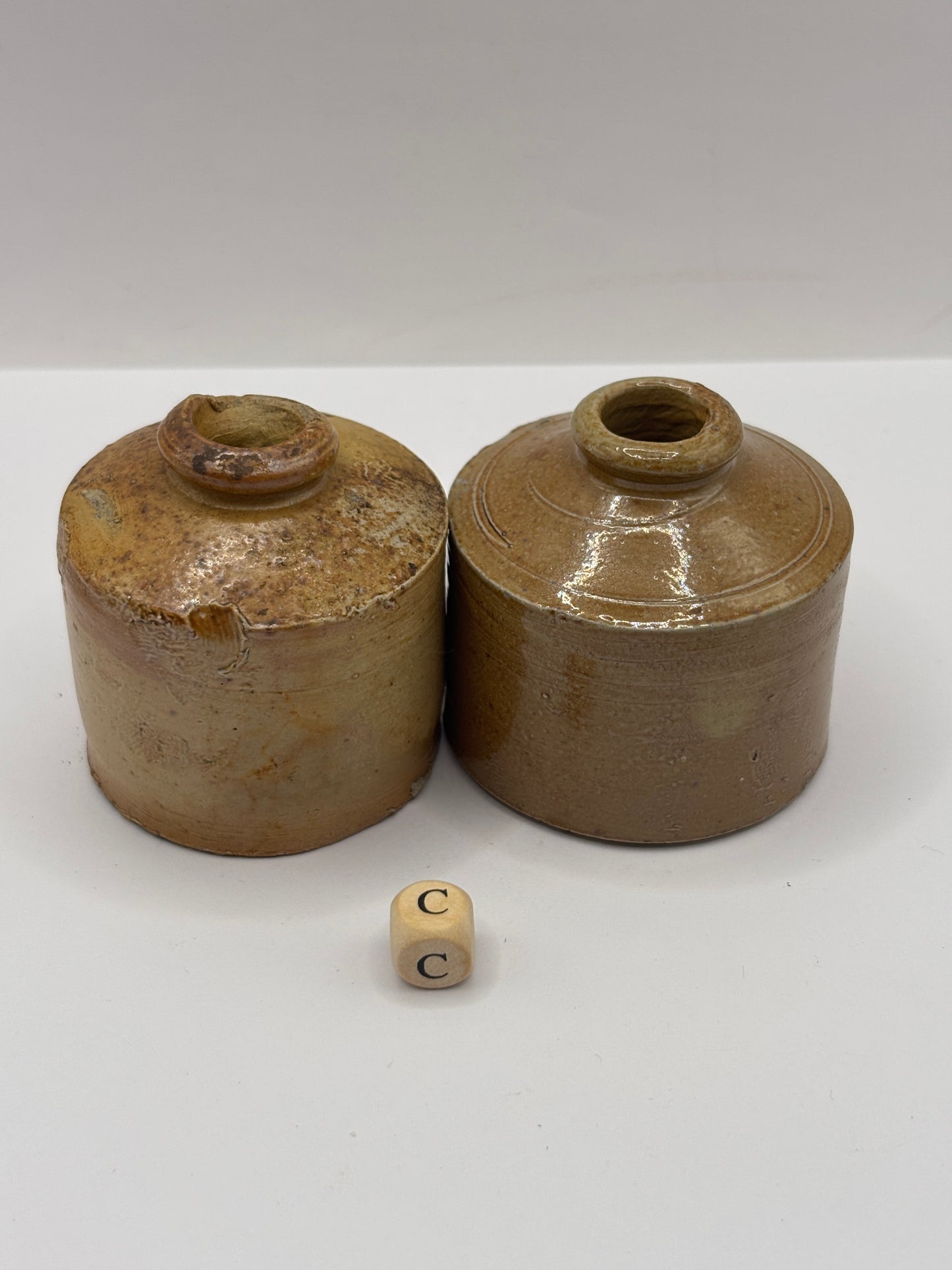 2 brown stoneware inkwells, ink bottles (c) pork pie inks