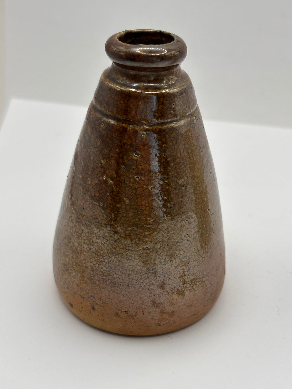 Old stoneware ink bottle, inkwell. Cone ink