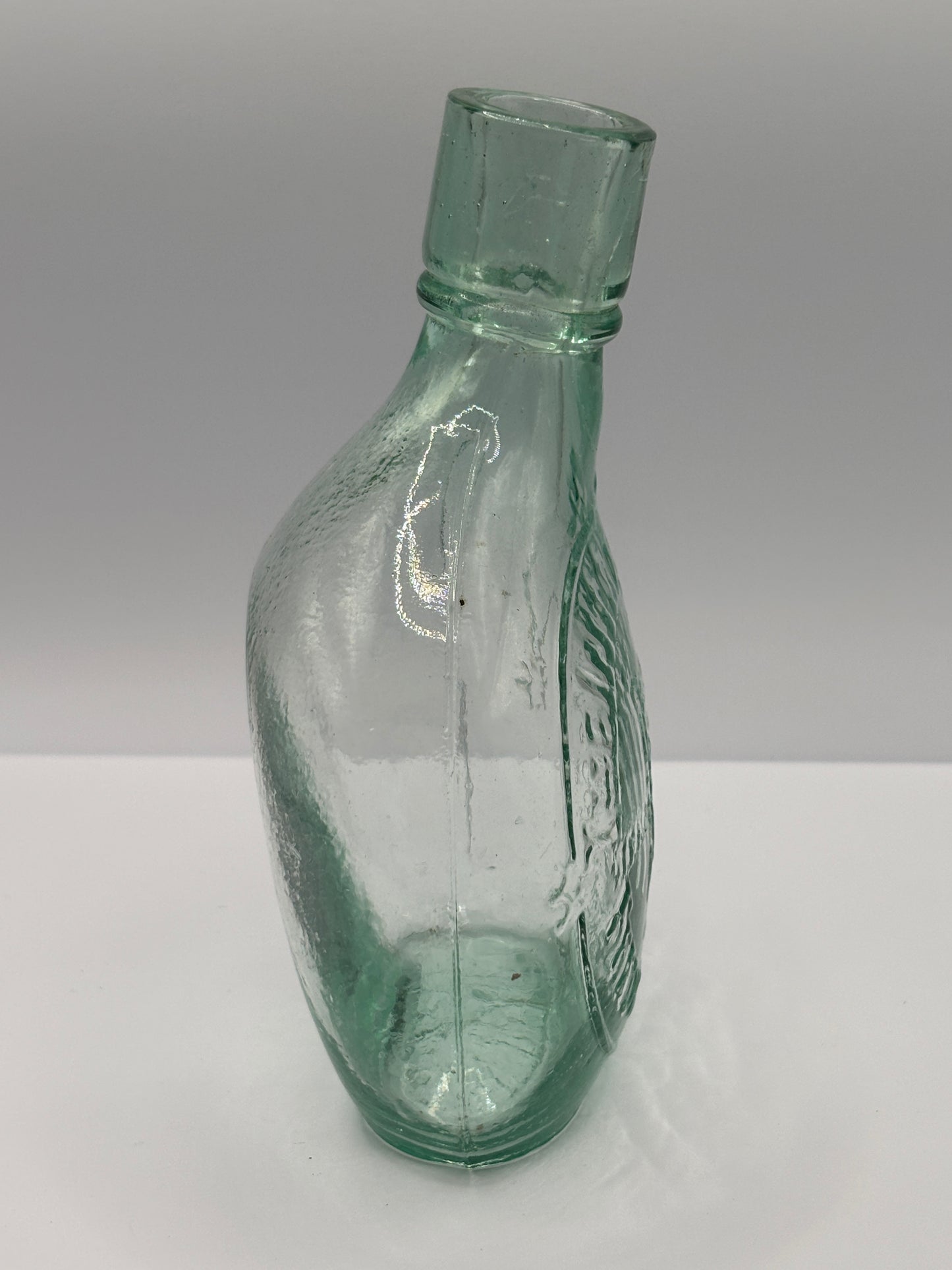 Old aqua glass baby feeder. The international feeder