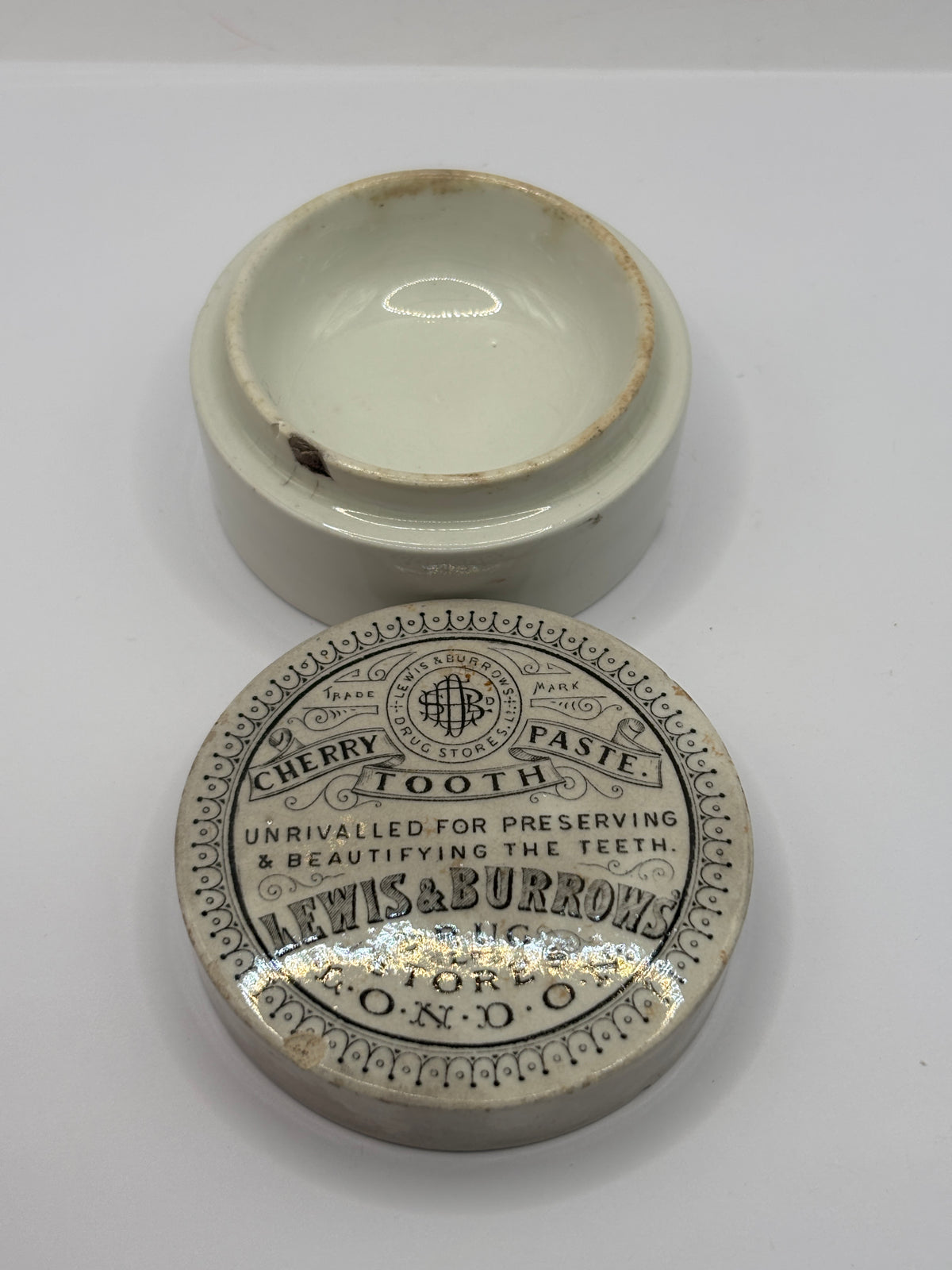 Old advertising lid and base. lewis & burrows cherry tooth paste 🍒