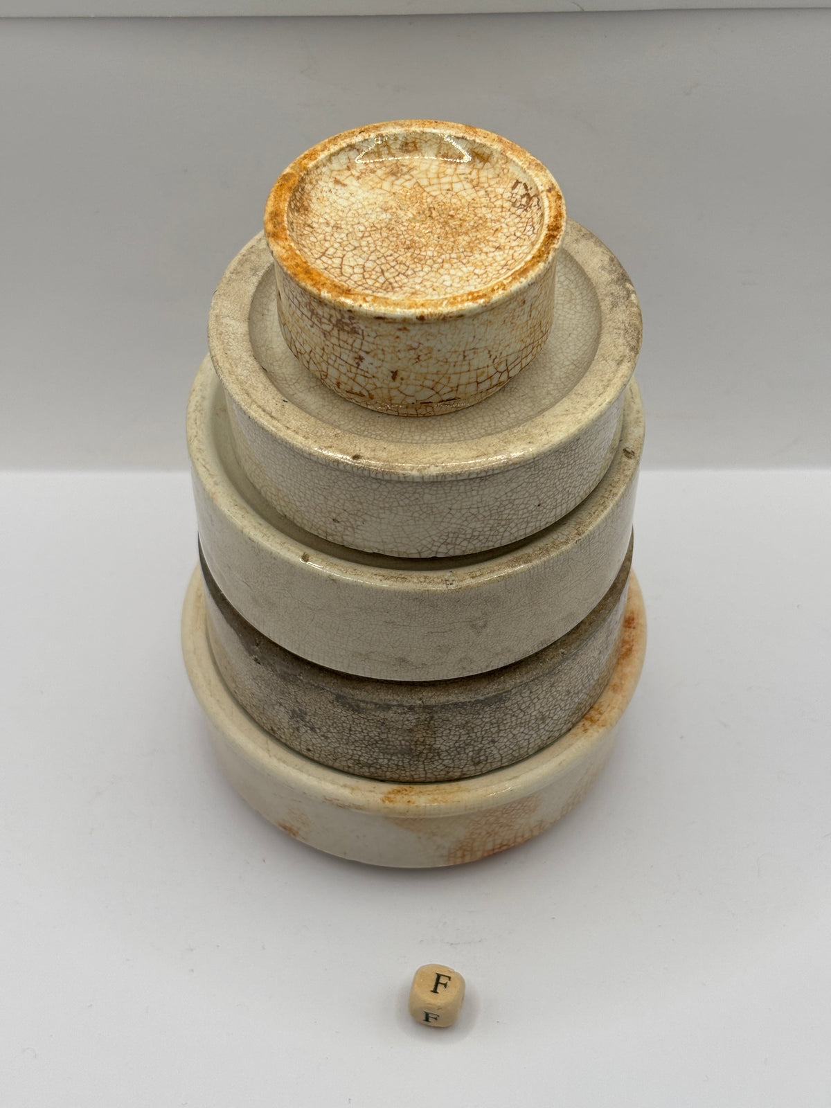 5 old stoneware pot lid bases, stackers (F)