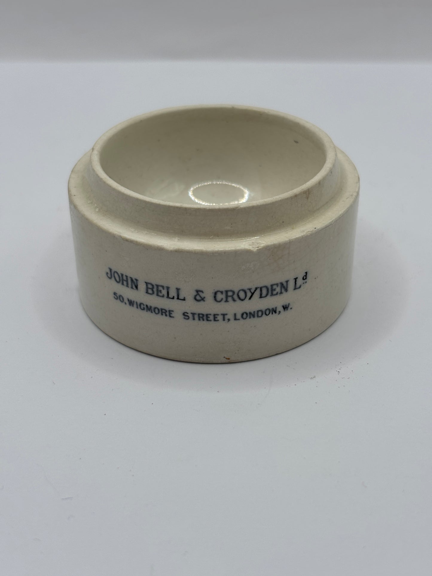 Old advertising chemist/pharmaceutical base. John Bell London