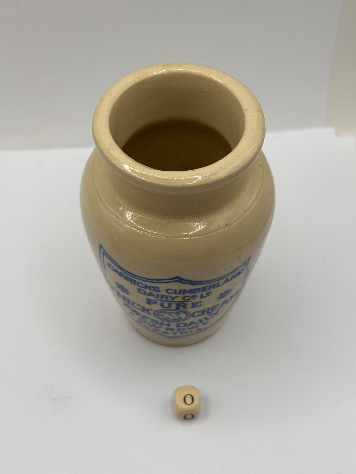 Old advertising cream pot, Carricks Cumberland dairy (o)