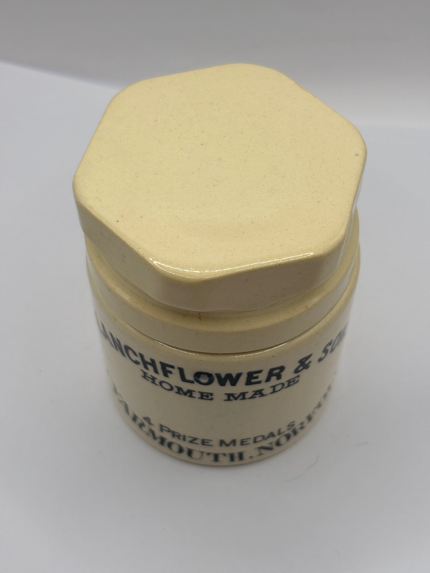 Old stoneware potted meat jar and lid. Blanchflower. Chipped