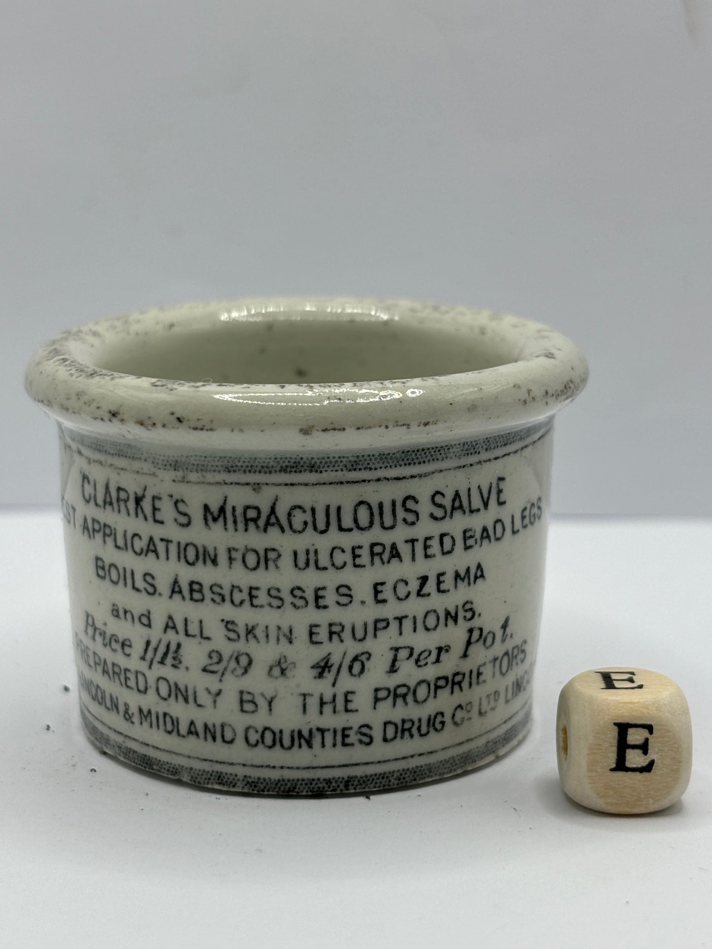 Small Clarke’s miraculous salve advertising ointment pot (e)