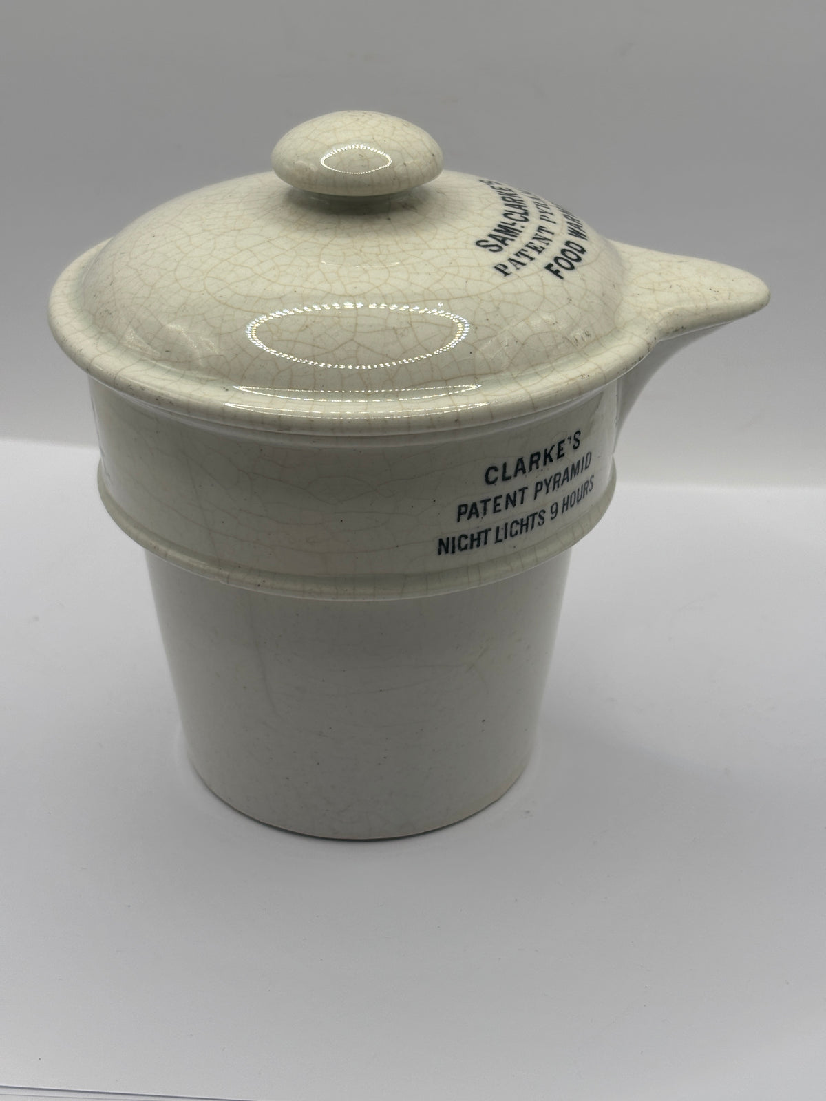 Old stoneware advertising food warmer, Clarkes pyramid food warmer & lid