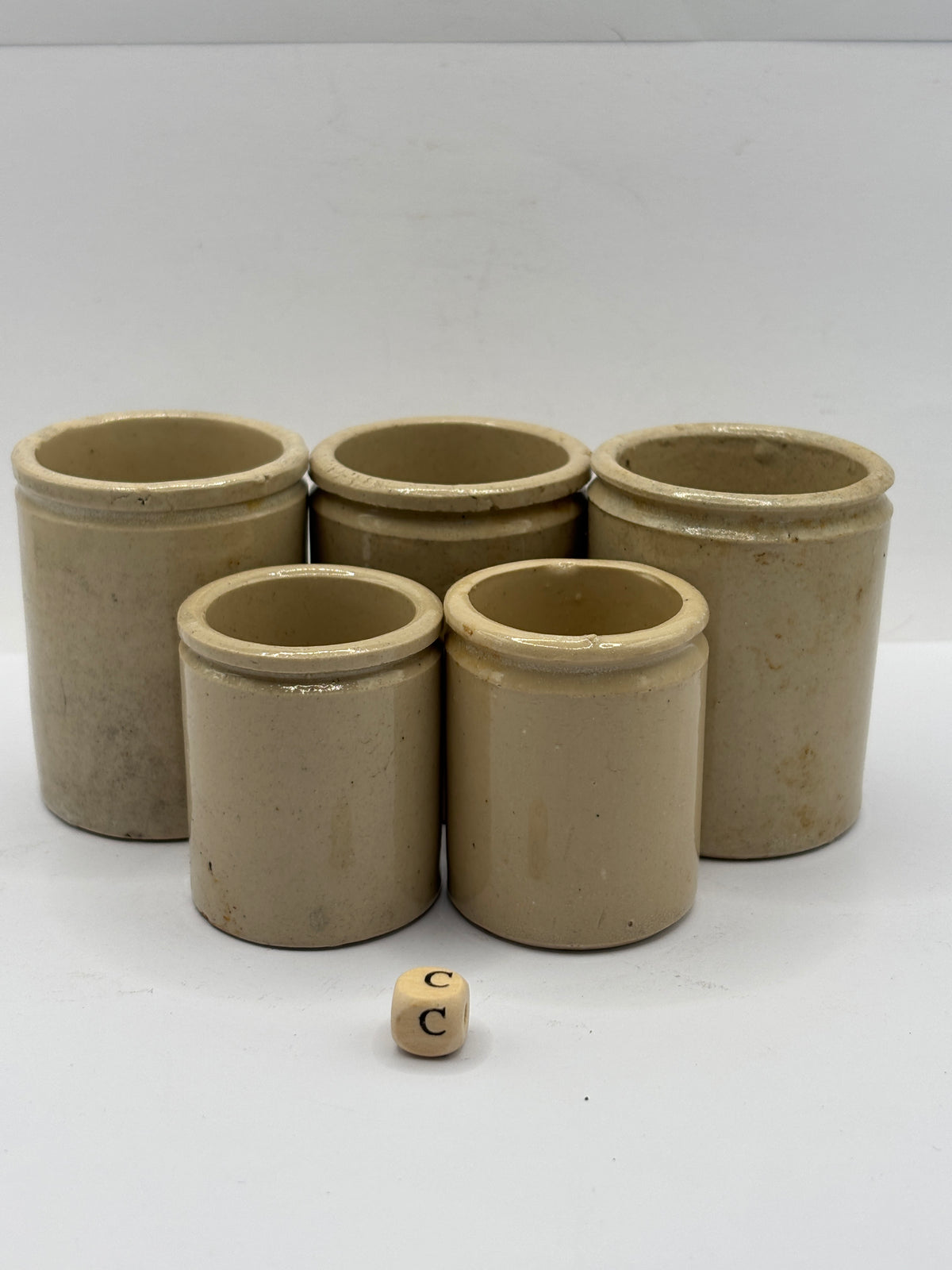 5 small stoneware pots (c)