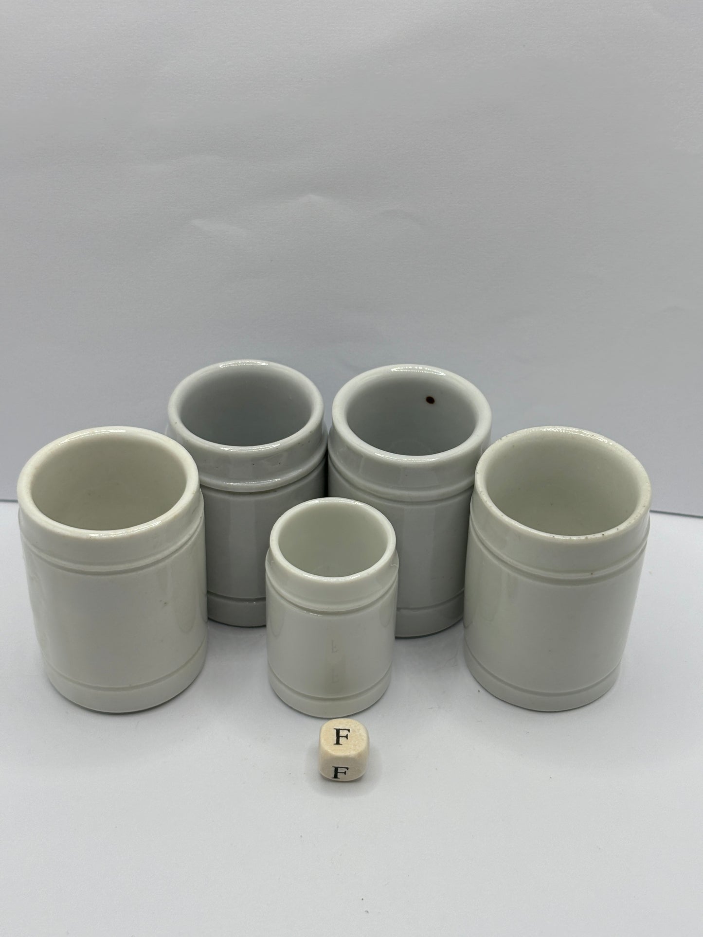 5 small white stoneware pots (F)