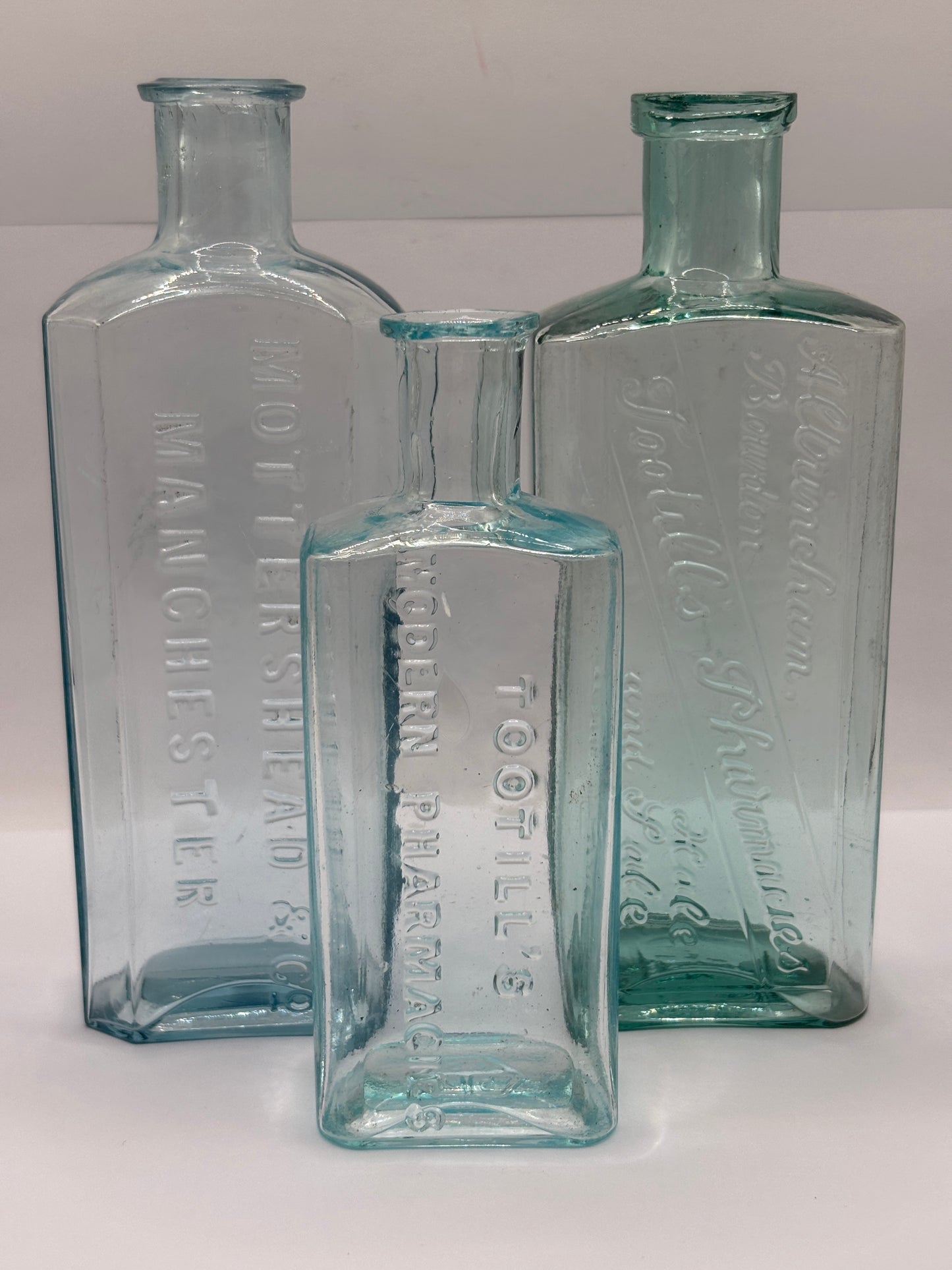 3 old aqua glass advertising chemist bottles
