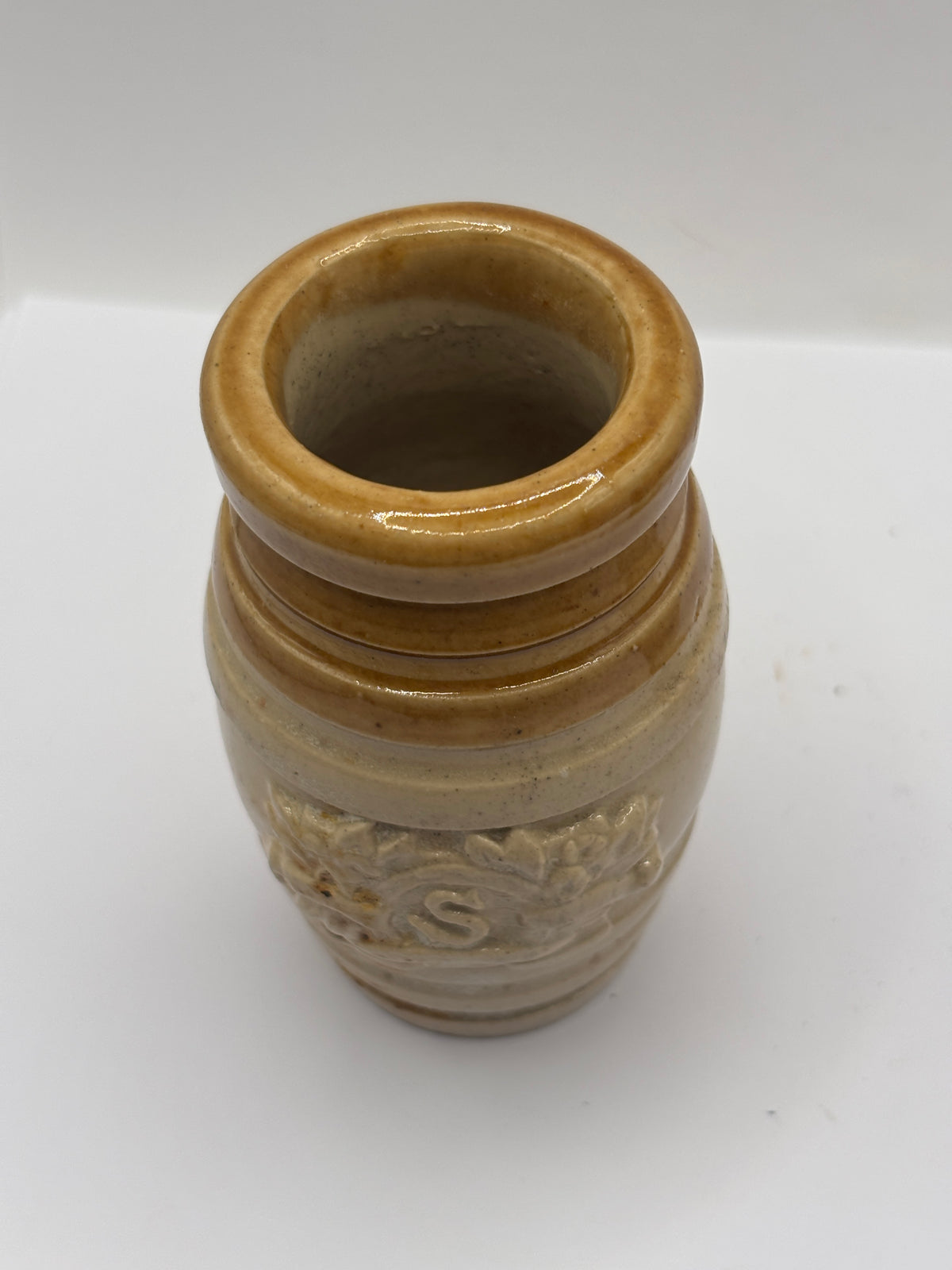 Old brown top stoneware senna jar