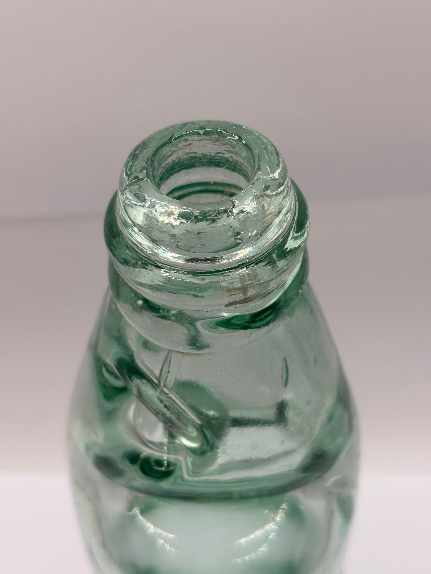 Old Hulme codd bottle with marble, Groves & Whitnall