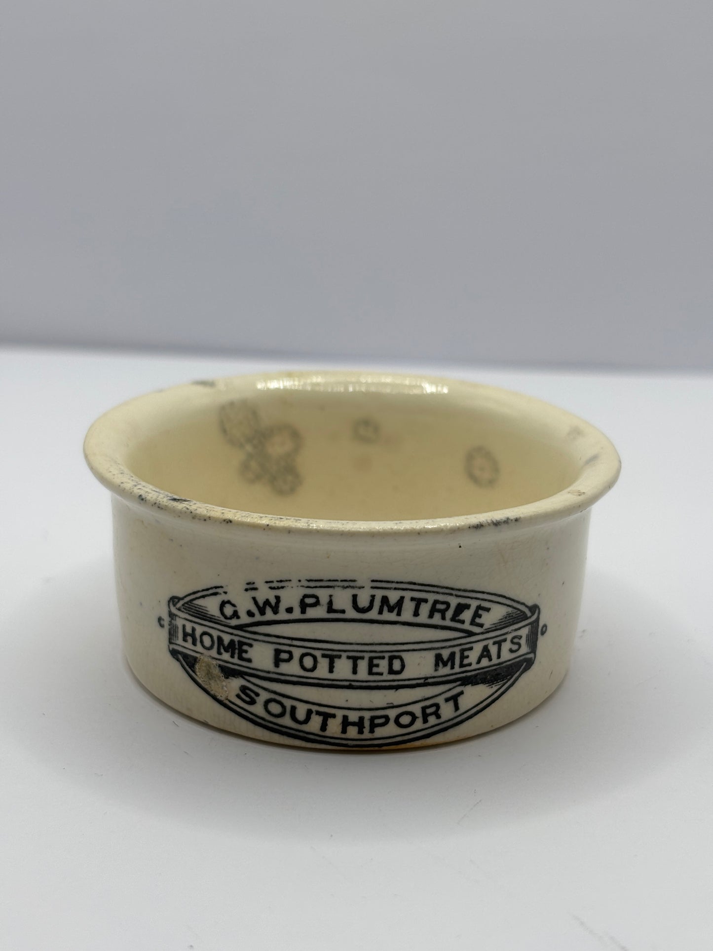 Small Plumtree home potted meats advertising pot